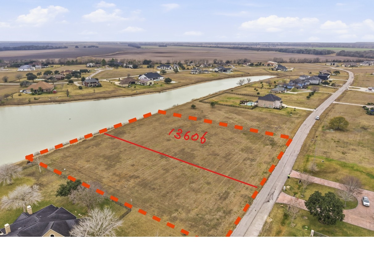 13606 Lake Ridge Drive Richmond, TX 77469 - Photo 1 of 16 a view of a sky from a terrace