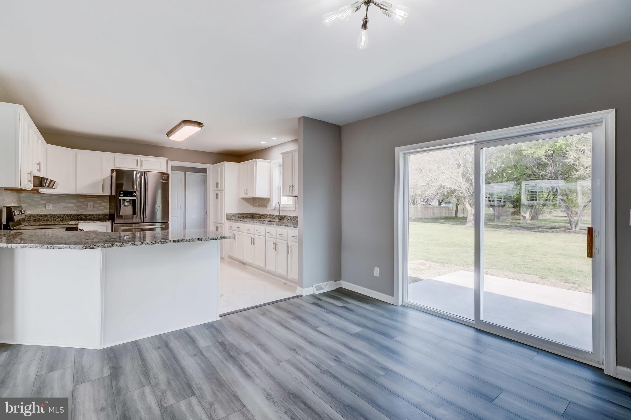 4854 Milligantown Road Hurlock, MD 21643 - Photo 22 of 48 Dining Room w/ sliders to rear