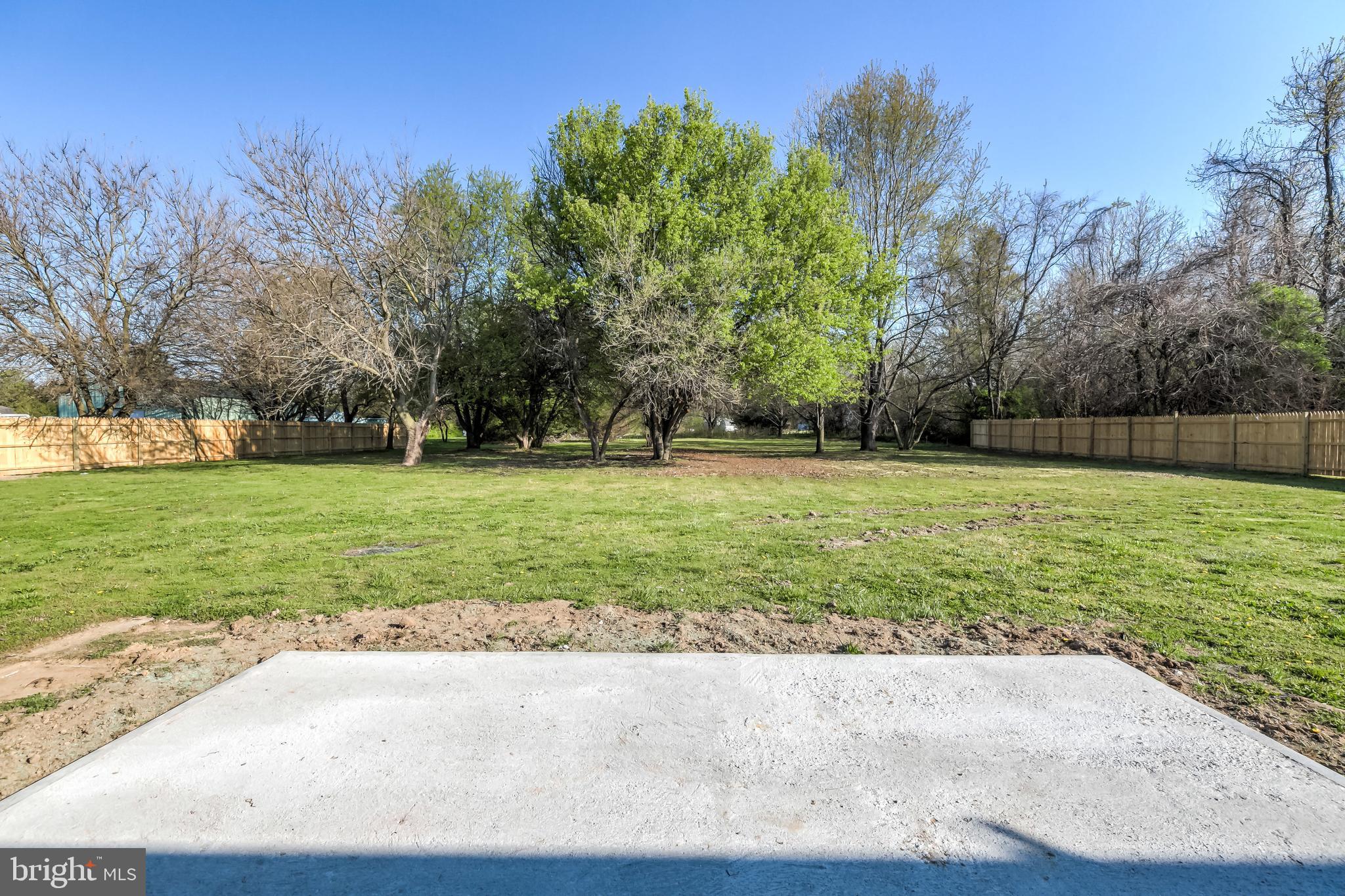 4854 Milligantown Road Hurlock, MD 21643 - Photo 40 of 48 Large fenced rear yard w/ concrete patio