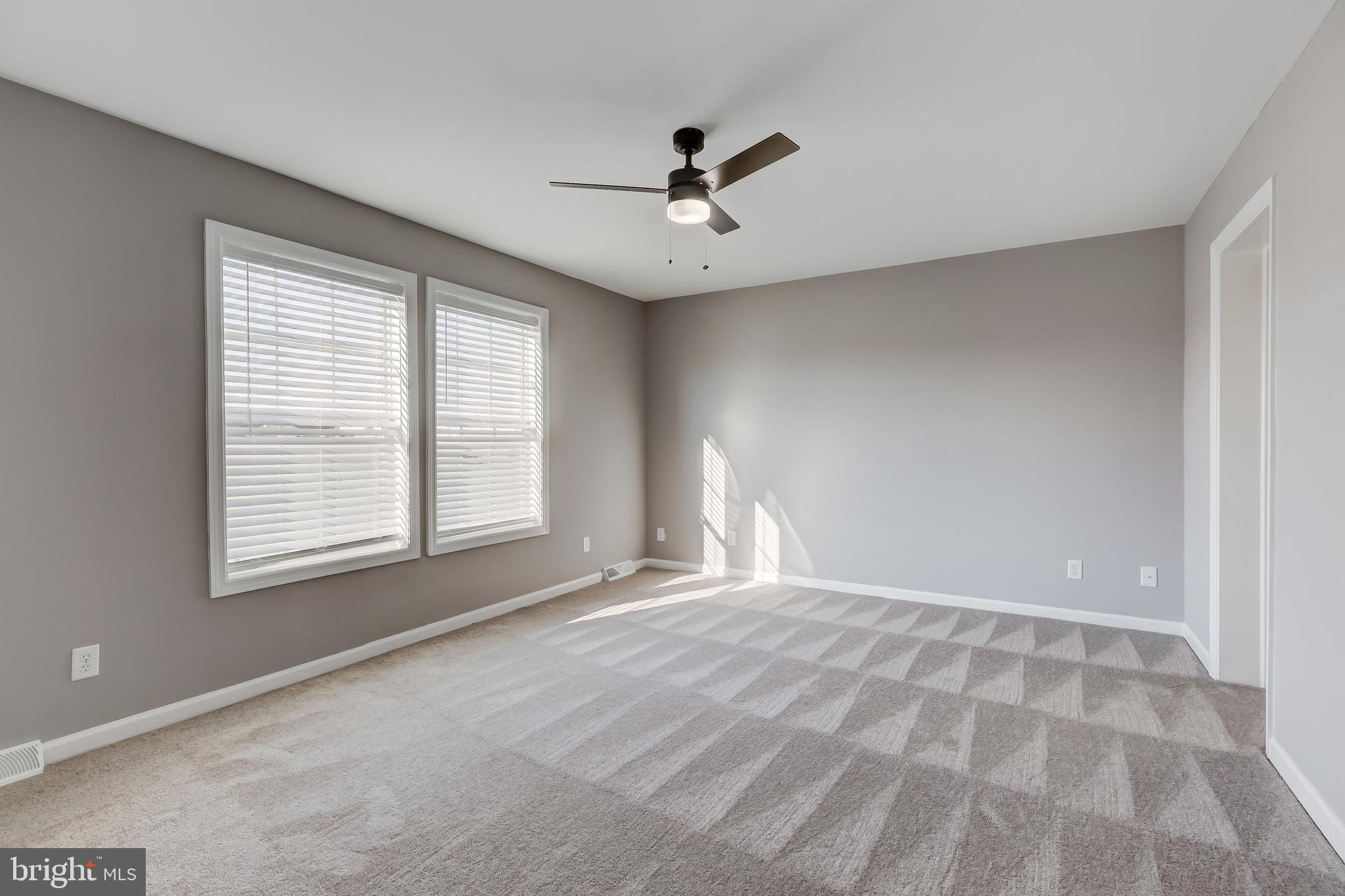 4854 Milligantown Road Hurlock, MD 21643 - Photo 8 of 48 Master bedroom w/ en suite