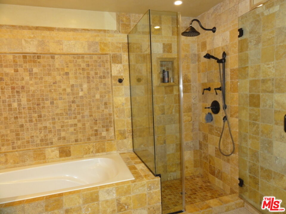 1880 Veteran Avenue, Unit 107 Los Angeles, CA 90025 - Photo 13 of 26 a bathroom with a shower