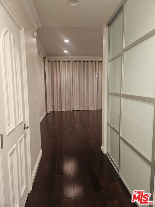 1880 Veteran Avenue, Unit 107 Los Angeles, CA 90025 - Photo 18 of 26 a view of a hallway with wooden floor