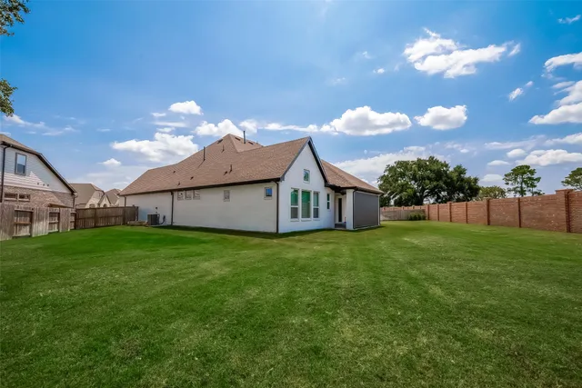 a house view with a garden space