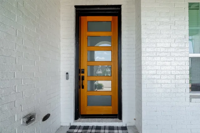a door and a window in the bathroom