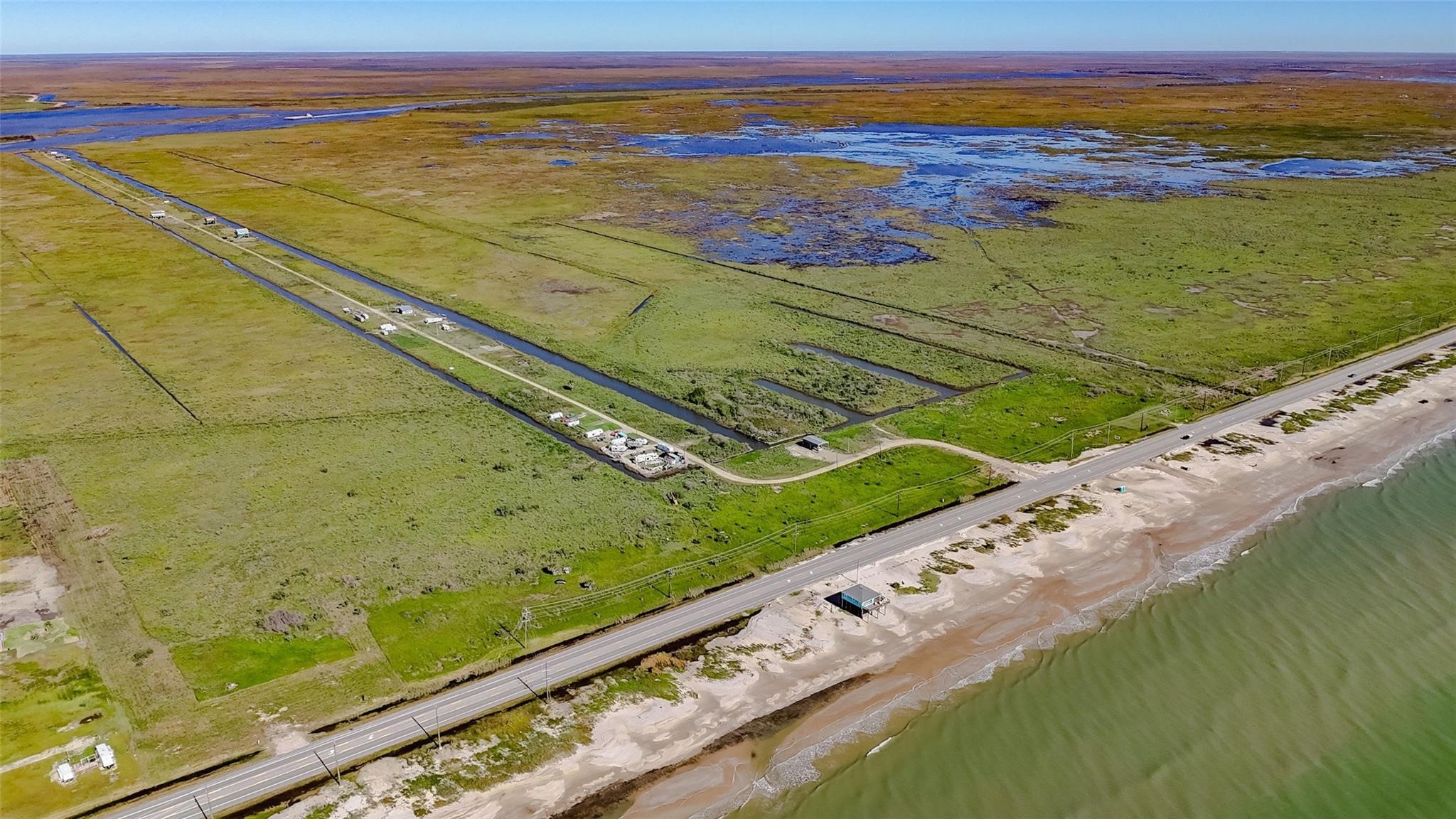 1015 3rd Street Port Bolivar, TX 77650 - Photo 5 of 10 a view of an outdoor space and a swimming pool view