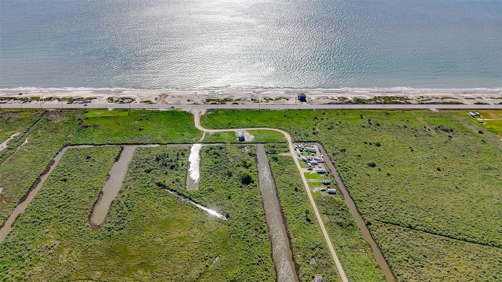 1015 3rd Street Port Bolivar, TX 77650 - Photo 8 of 10 an aerial view of a pool