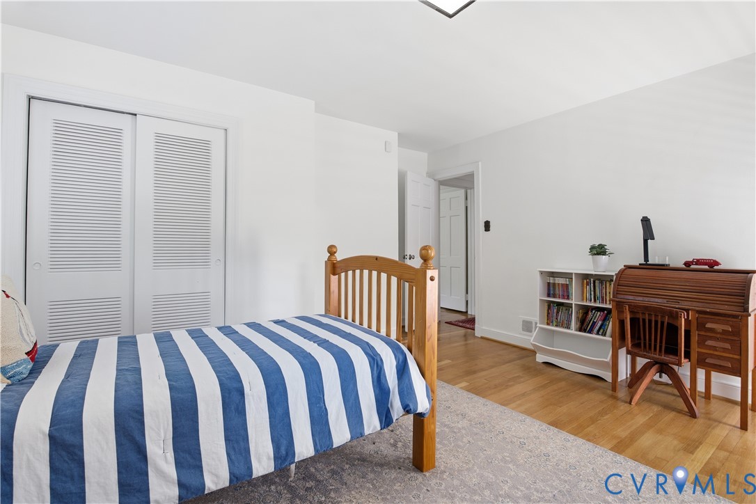 6405 Buckhill Road Richmond, VA 23225 - Photo 29 of 71 Bright room with wood-finish flooring, white walls