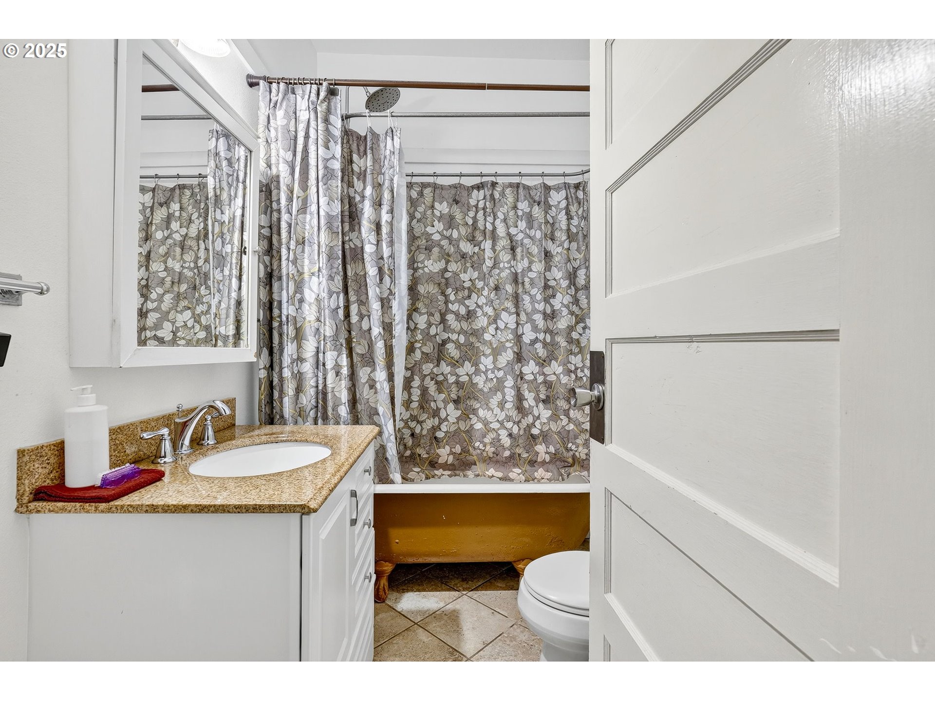 6404 Northeast 10th Avenue Portland, OR 97211 - Photo 19 of 31 a bathroom with a sink toilet and shower
