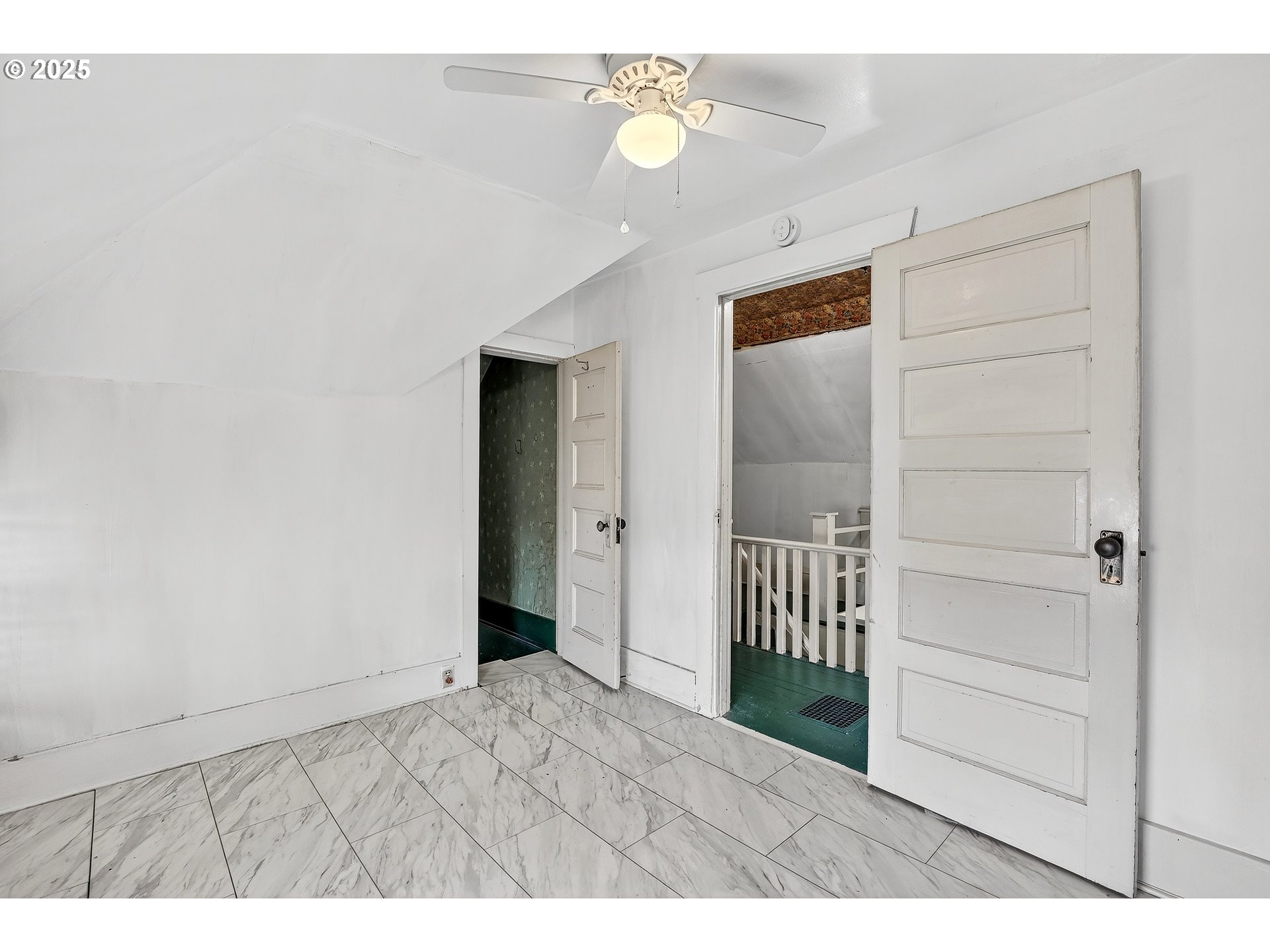 6404 Northeast 10th Avenue Portland, OR 97211 - Photo 33 of 45 a view of a hallway with wooden floor and entryway