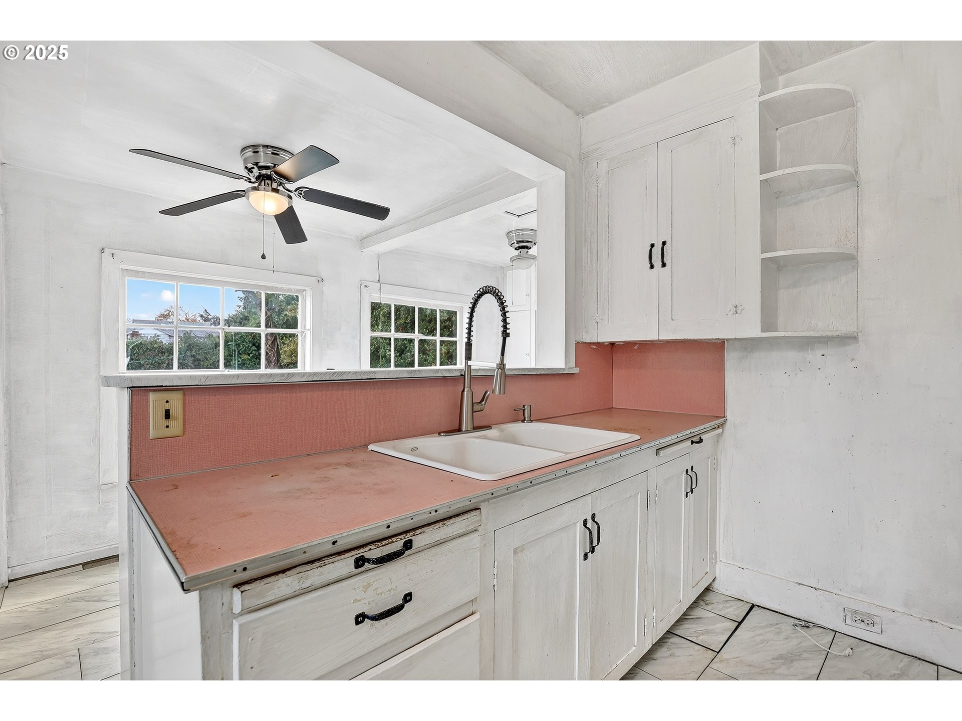 6404 Northeast 10th Avenue Portland, OR 97211 - Photo 42 of 45 a kitchen with a sink cabinets and window