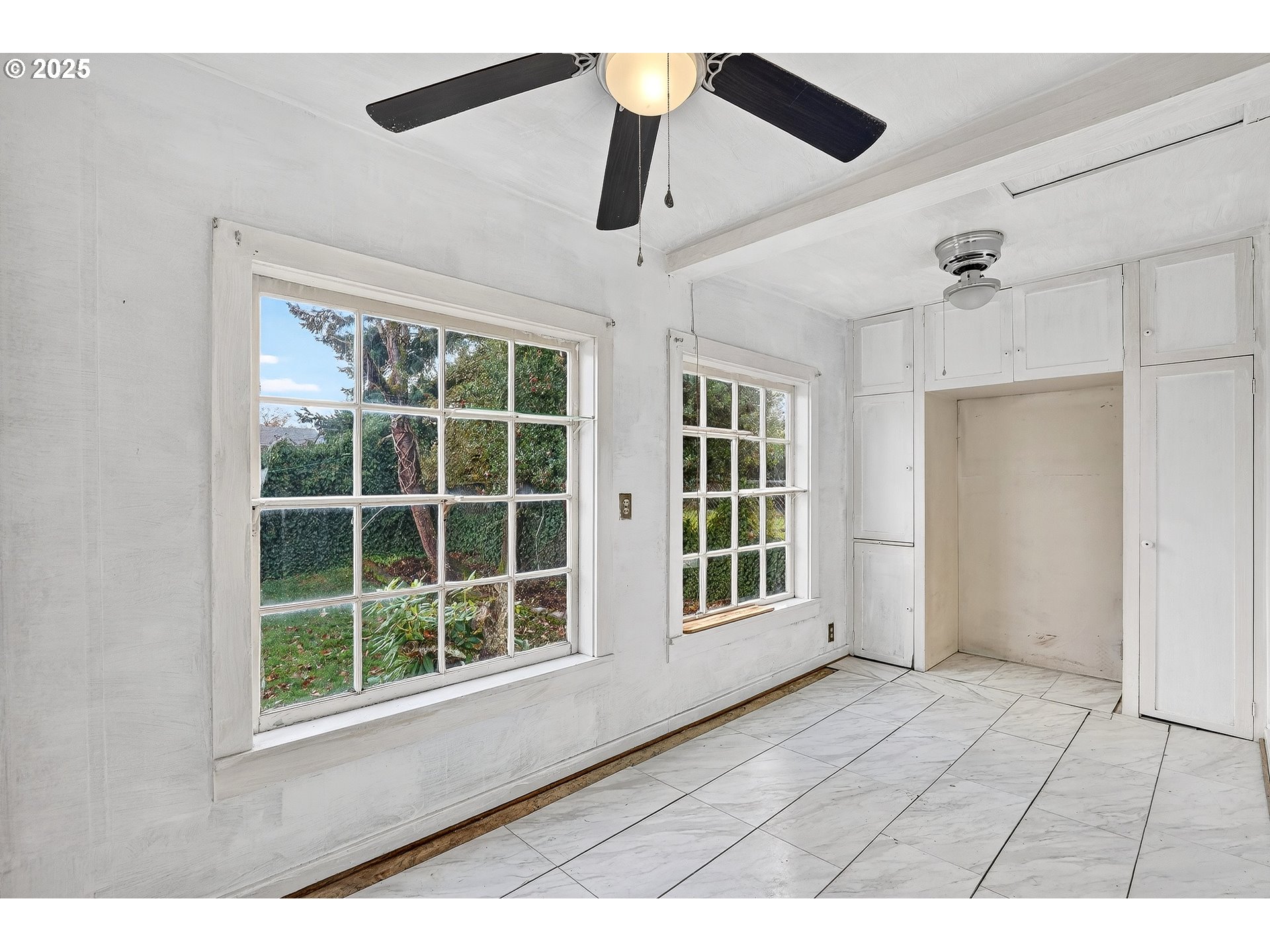 6404 Northeast 10th Avenue Portland, OR 97211 - Photo 43 of 45 a view interior of a house with wooden floor and windows