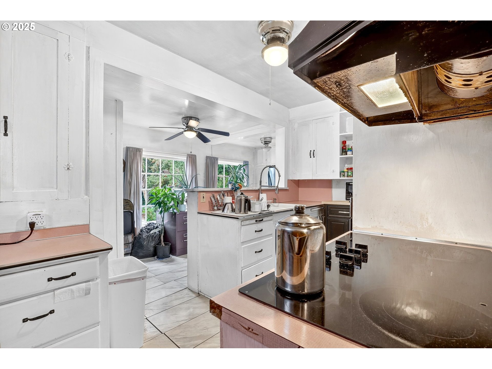 6404 Northeast 10th Avenue Portland, OR 97211 - Photo 7 of 31 a kitchen with a sink appliances and cabinets