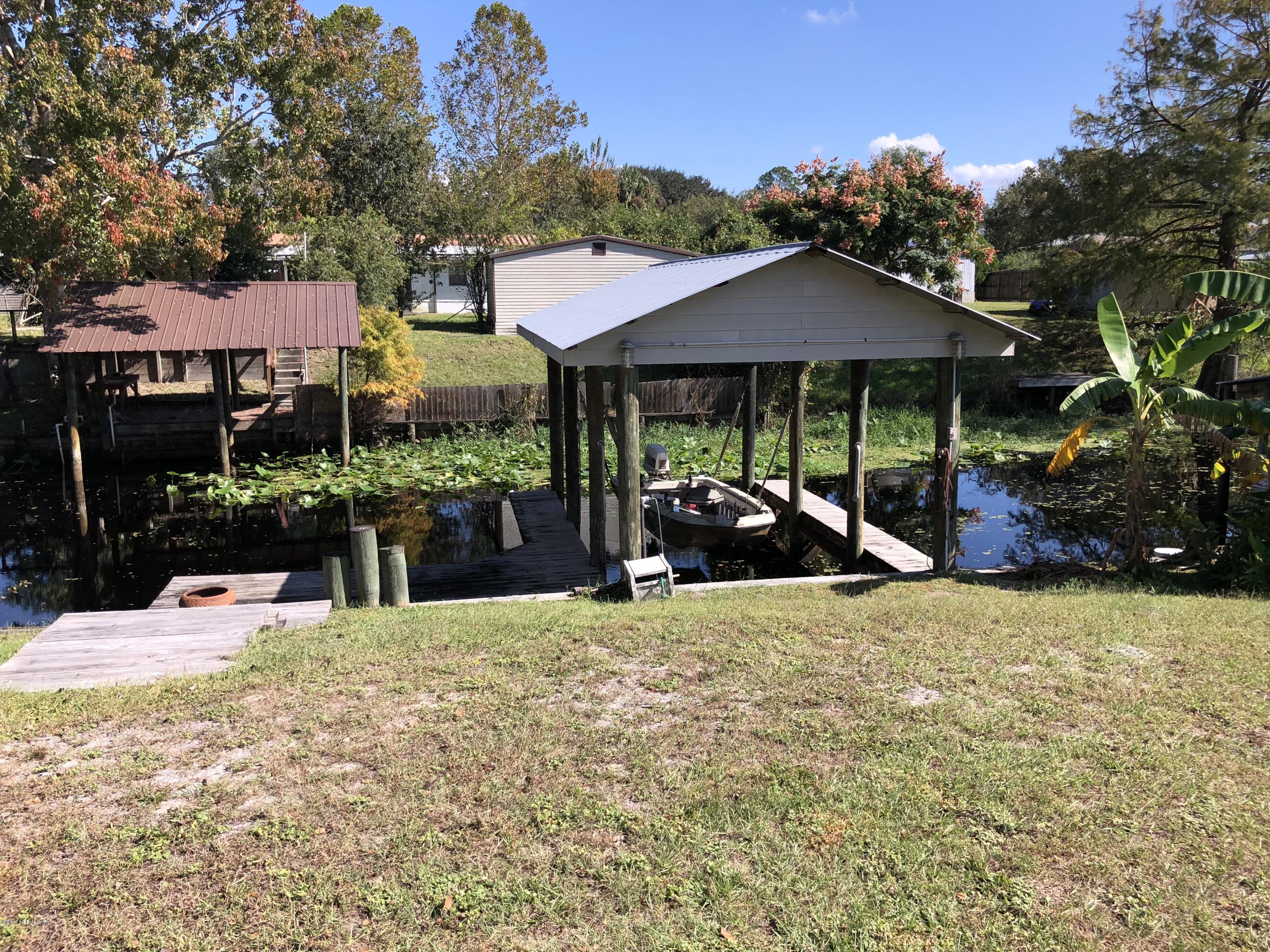 126 Riverside Avenue Satsuma, FL 32189 - Photo 20 of 22 Back yard overlooking canal