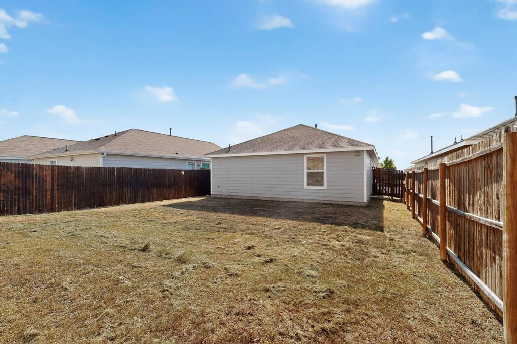 5516 McClelland Street Forney, TX 75126 - Photo 4 of 36 View of fenced backyard