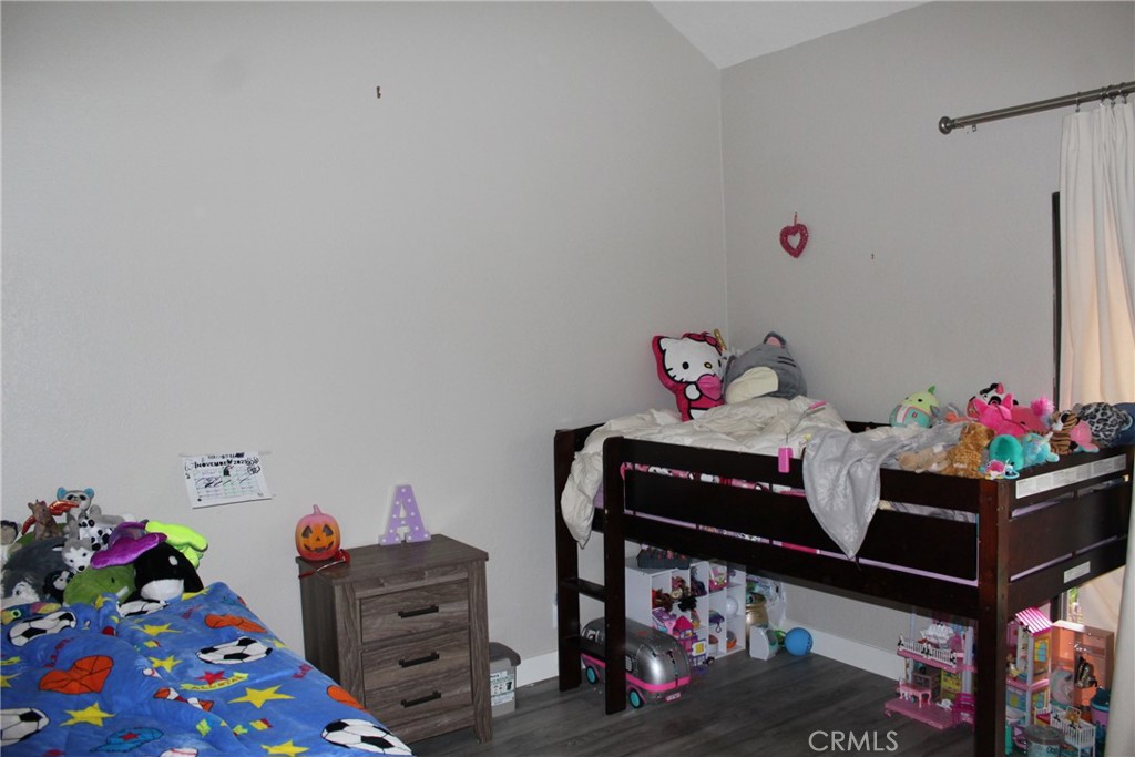 8267 San Bernardino Road Rancho Cucamonga, CA 91730 - Photo 13 of 32 a room with toys and storage