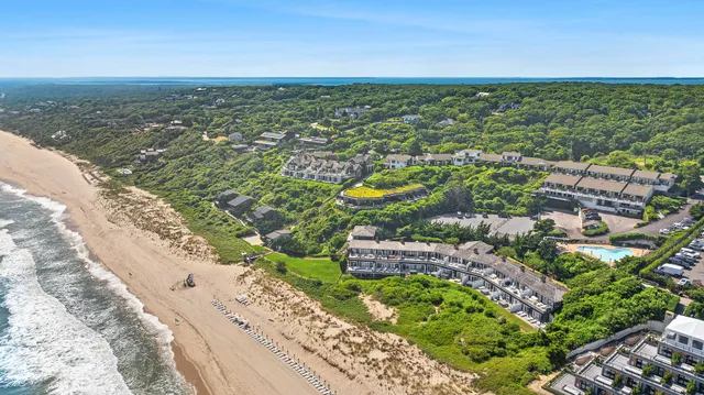 a view of a city with an ocean