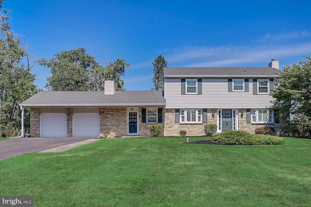 Exterior Front with Double Garage.