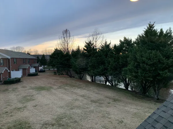 front view of a house with a small yard