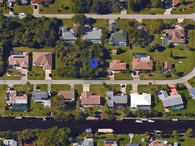 a view of a road with a building in the background