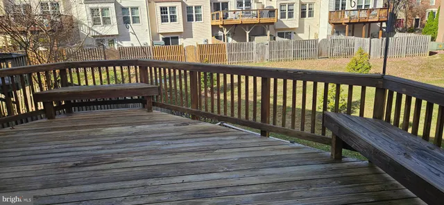 a view of balcony with wooden floor