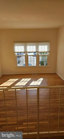 a view of a room with windows