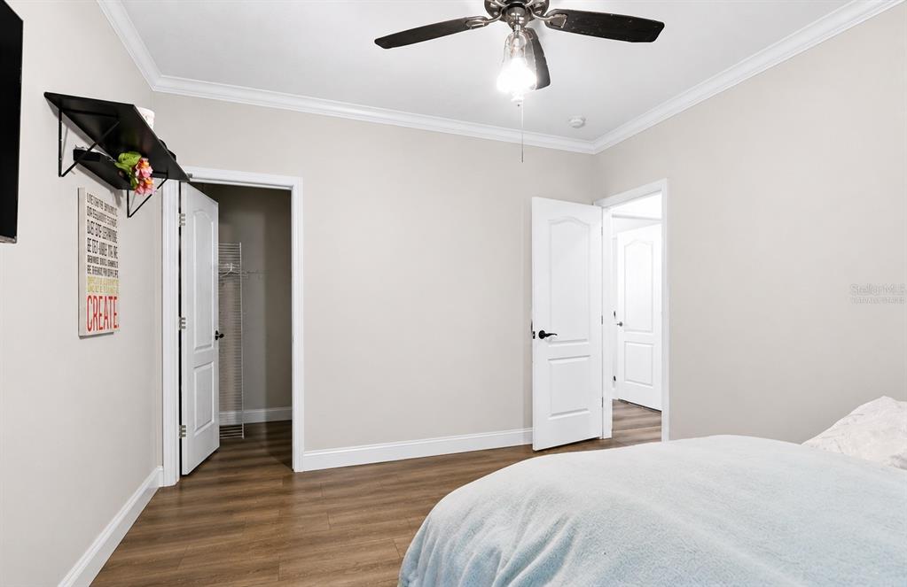 8010 Palmer Road Bartow, FL 33830 - Photo 18 of 22 a bedroom with a bed and a mirror