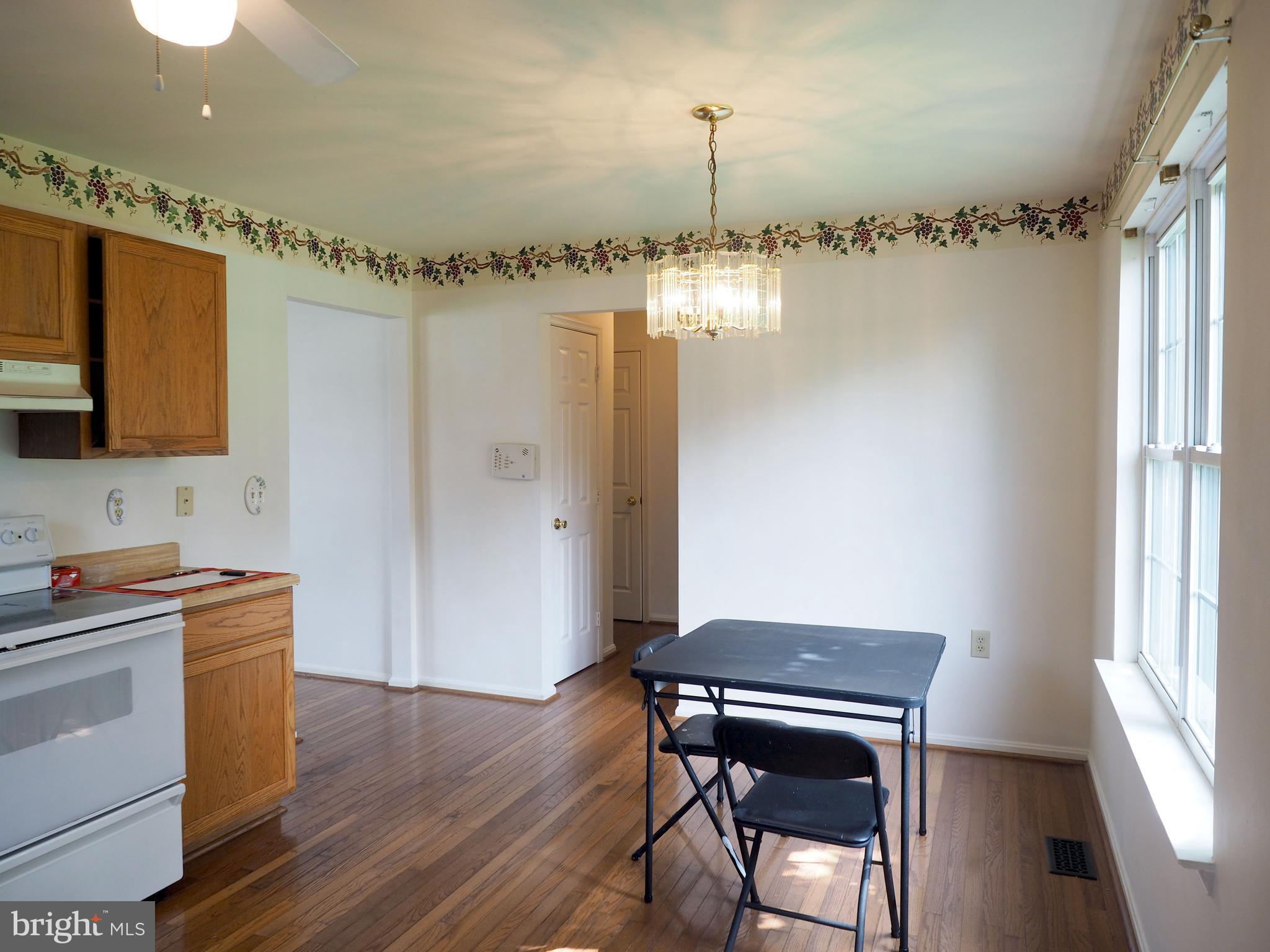 118 Ranson Estates Circle Ranson, WV 25438 - Photo 6 of 15 a view of a room with a table and chairs