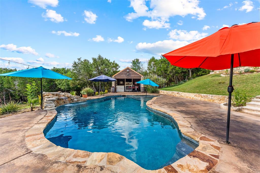 124 Bluffview Circle China Spring, TX 76633 - Photo 32 of 40 Freeform swimming pool featuring a natural rock waterfall