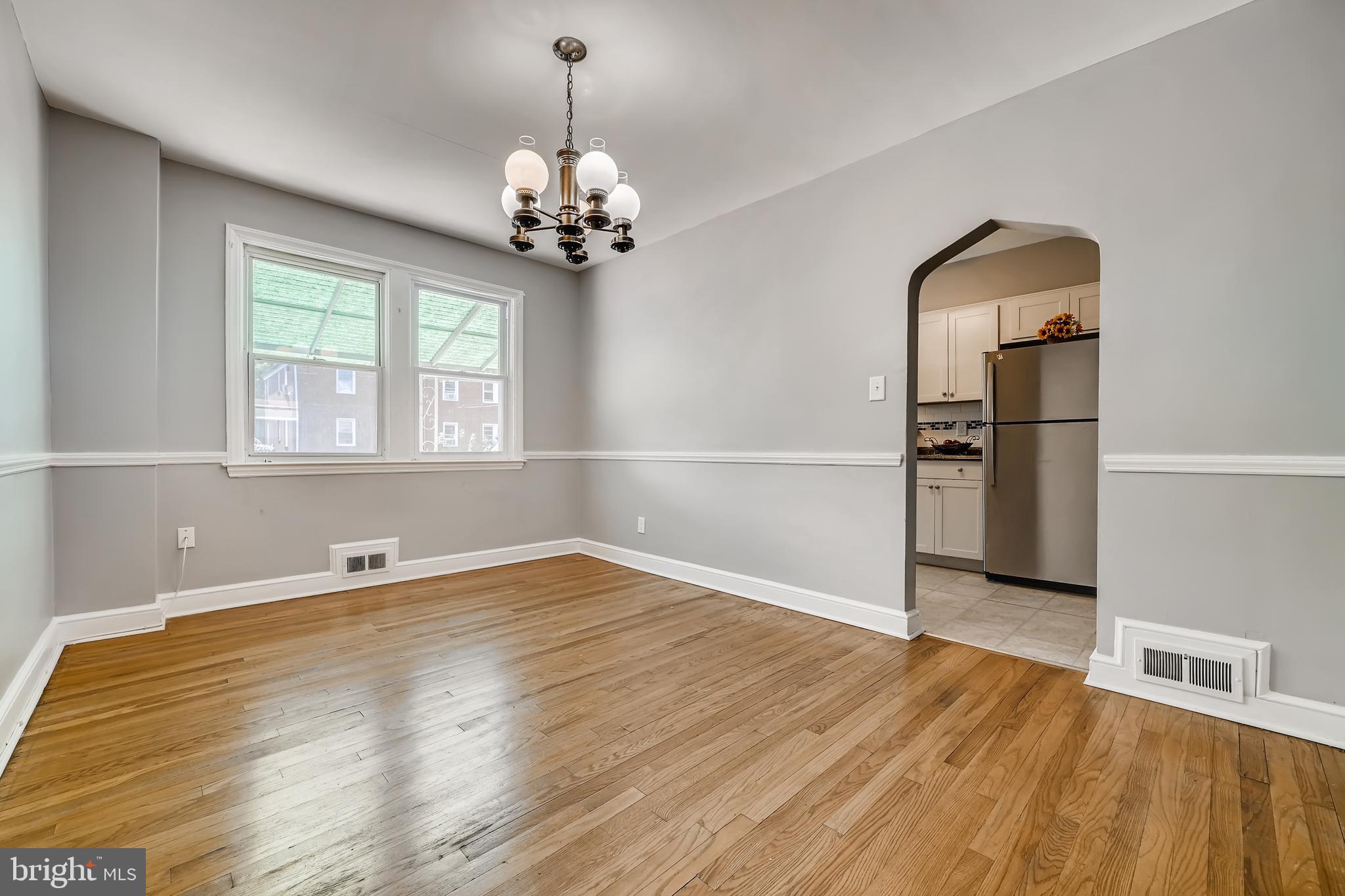 4029 Grantley Road Baltimore, MD 21215 - Photo 2 of 16 SEPARATE DINING ROOM WITH BEAUTIFUL WOOD FLOORS