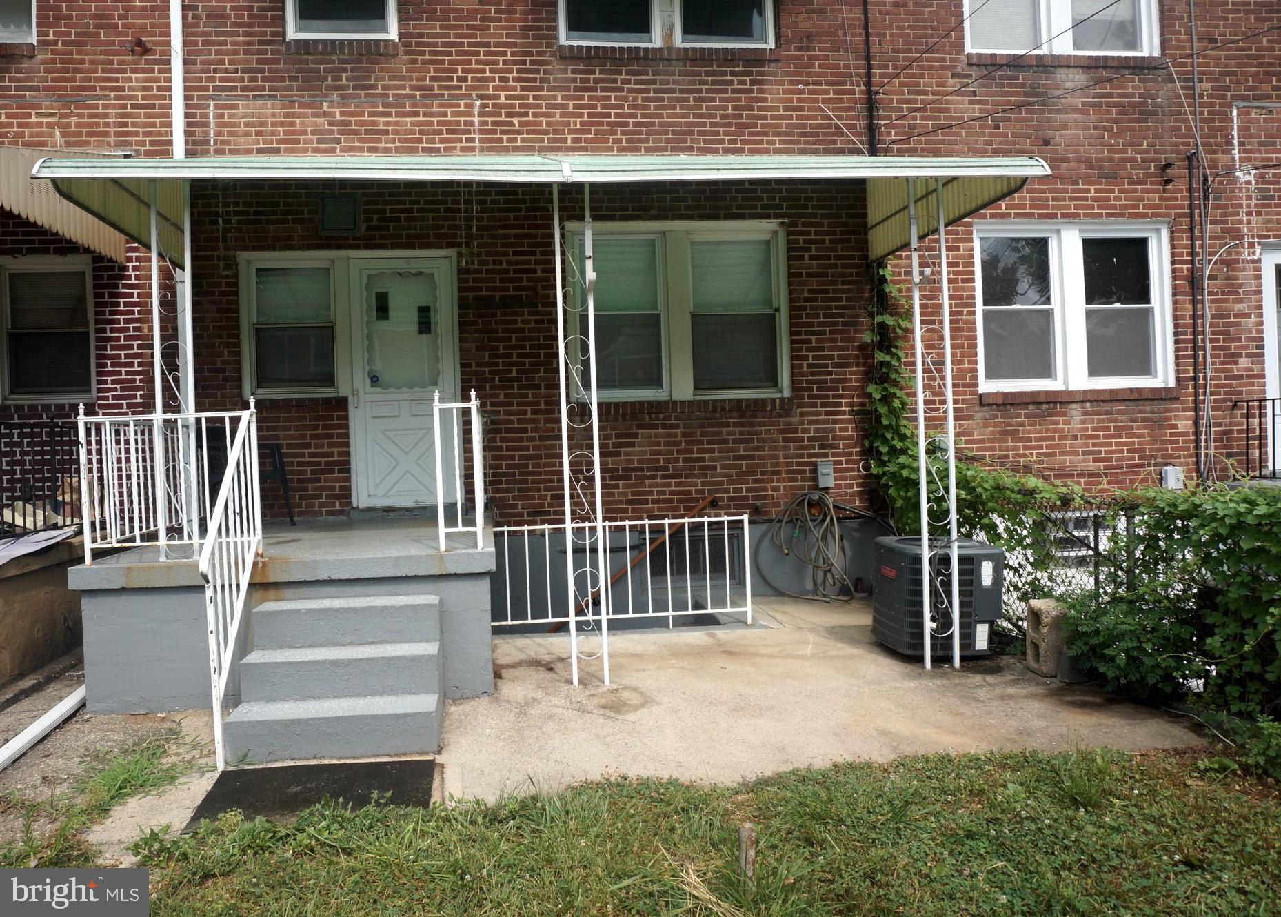 4029 Grantley Road Baltimore, MD 21215 - Photo 14 of 16 BACK COVERED PORCH