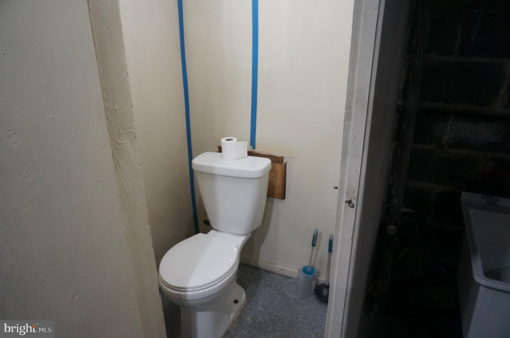 4029 Grantley Road Baltimore, MD 21215 - Photo 10 of 16 CONVENIENT 1/2 BATH IN BASEMENT