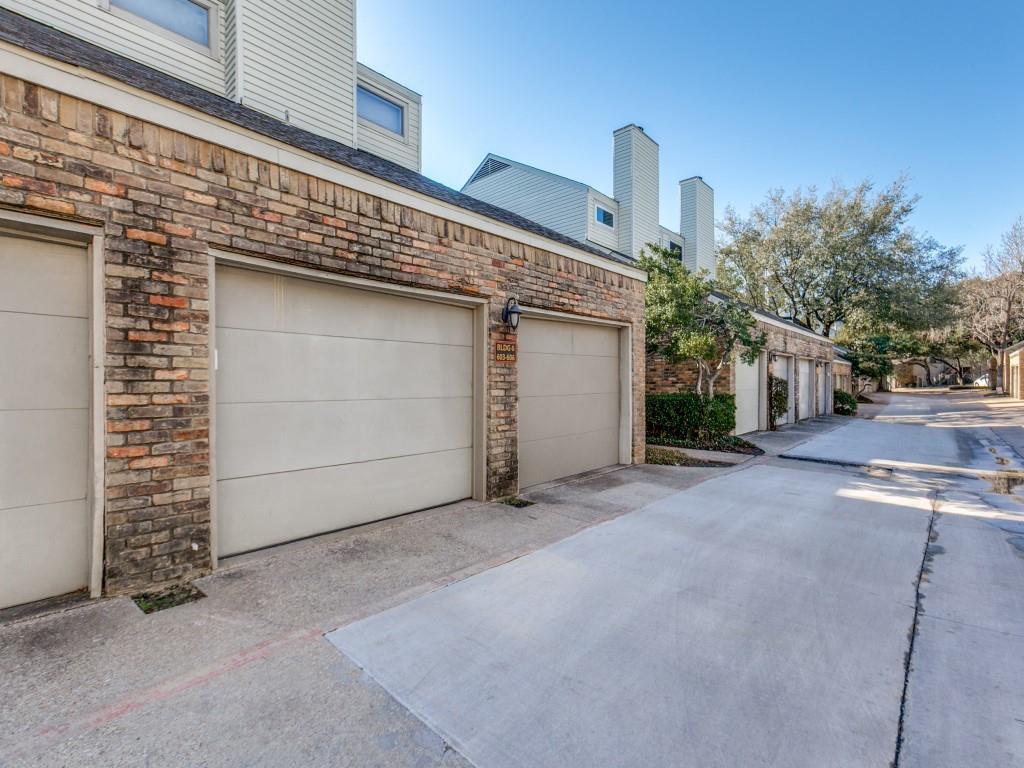 7340 Skillman Street, Unit 605 Dallas, TX 75231 - Photo 1 of 25 a view of a house with a garage