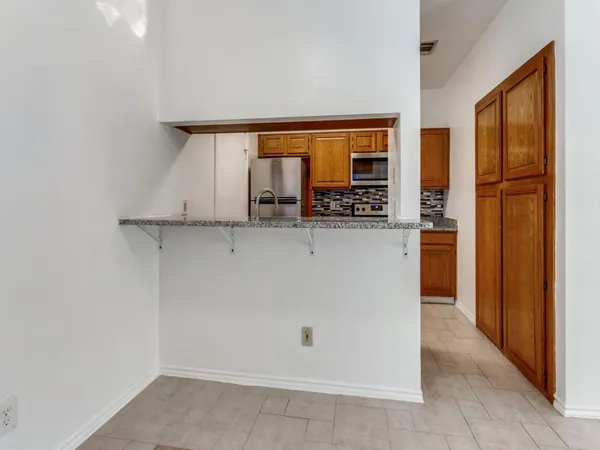 a view of a kitchen with an entryway