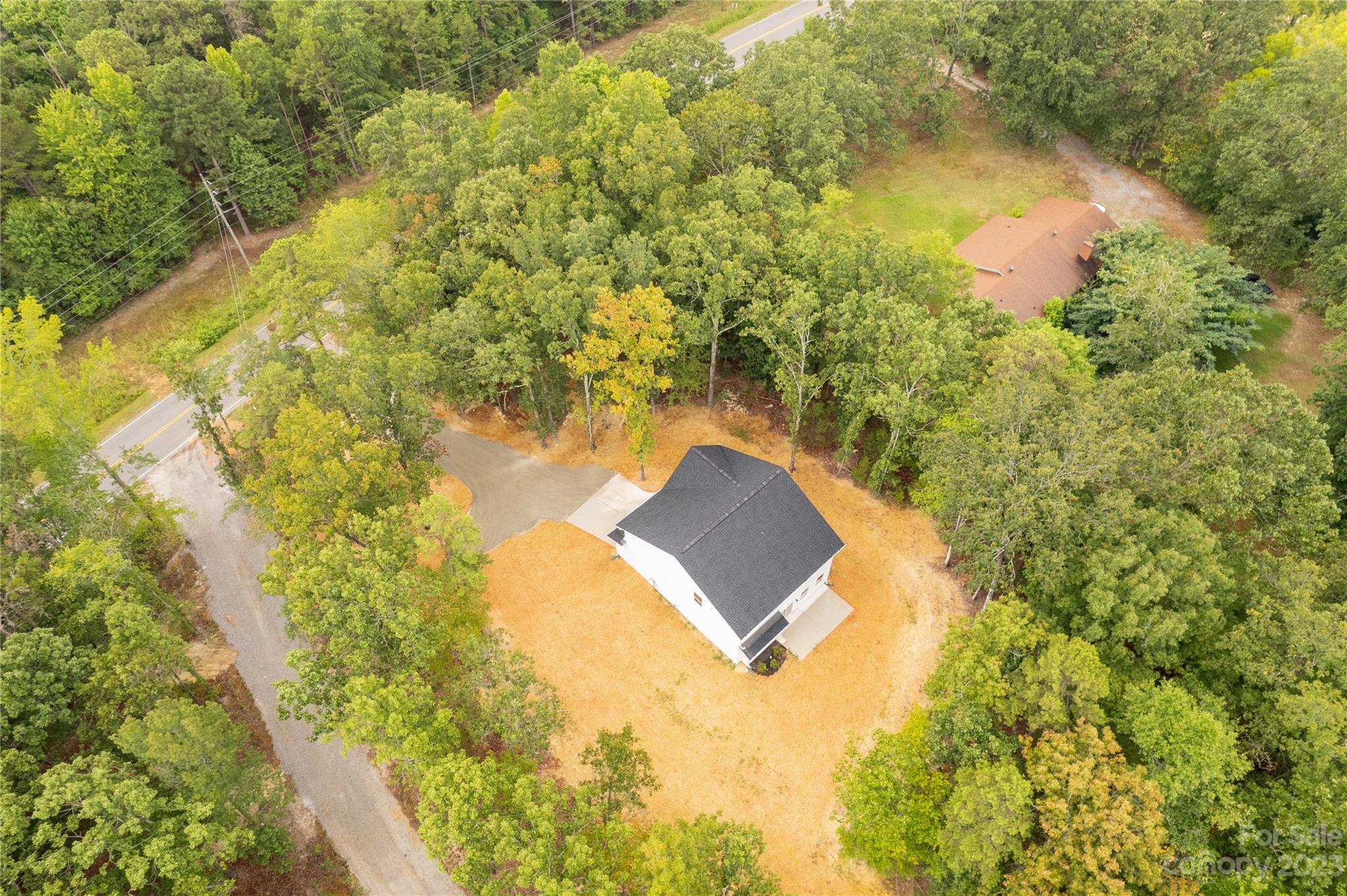 4081 Taxahaw Road Lancaster, SC 29720 - Photo 5 of 36 a view of a lake from a tree