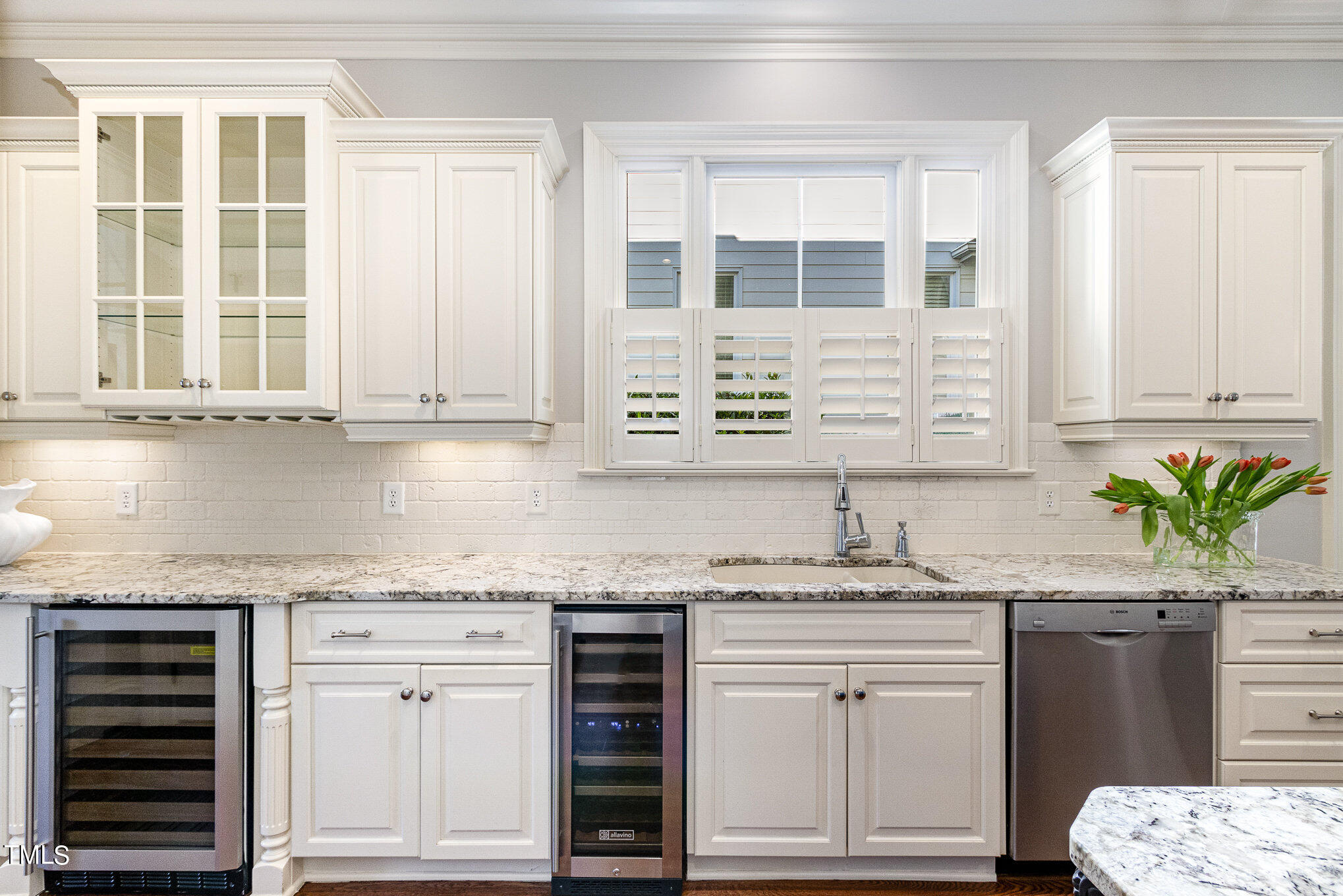 7814 Monument Lane Raleigh, NC 27615 - Photo 13 of 52 Two wine refrigerators with sliding shelves