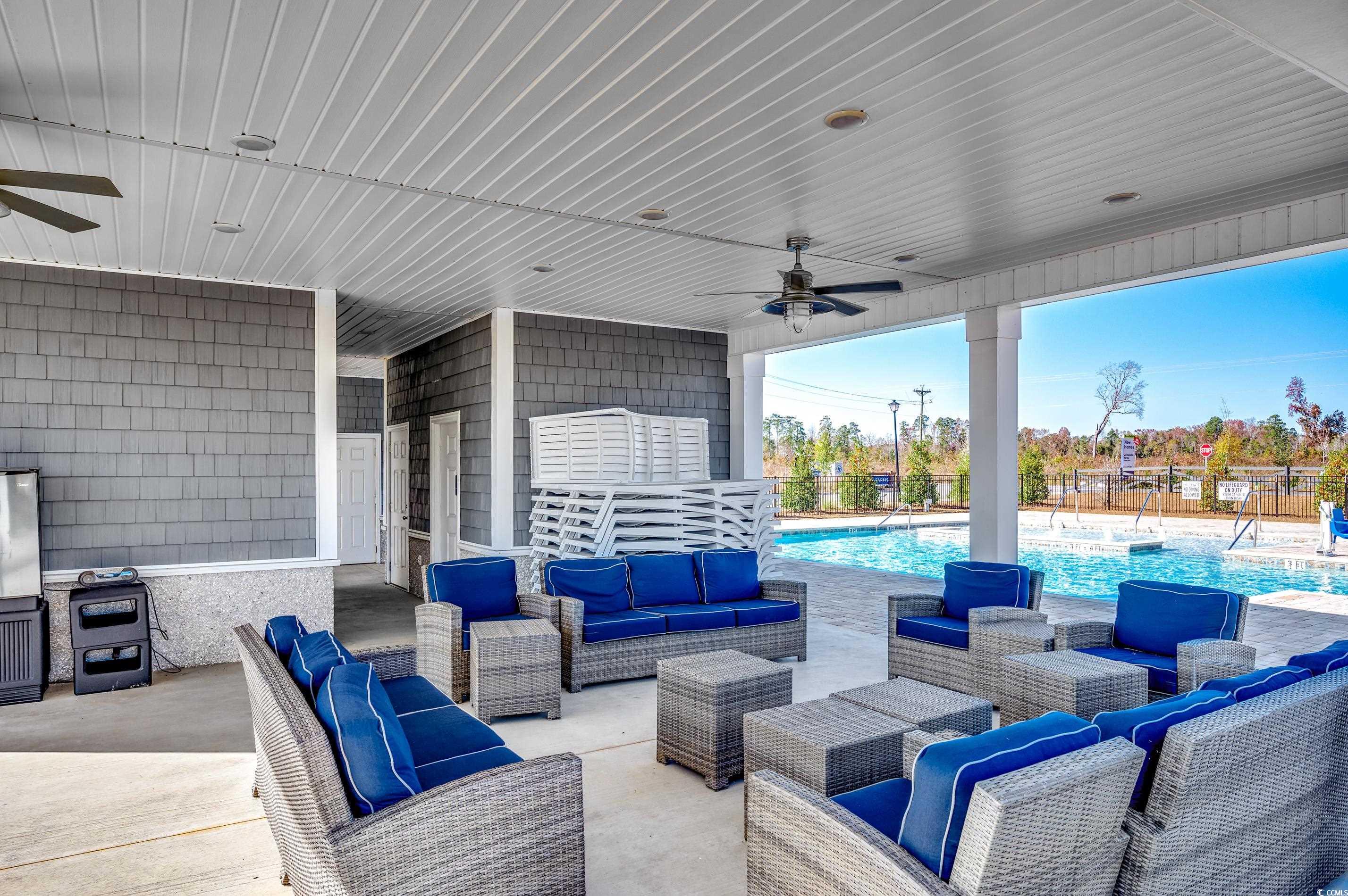 256 Country Grove Way Galivants Ferry, SC 29544 - Photo 21 of 22 View of patio featuring ceiling fan and an outdoor living space