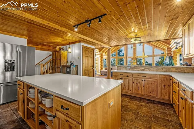 a bathroom with a shower curtain and a toilet