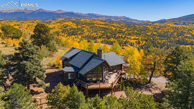 a view of a house with a mountain