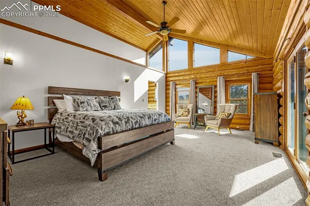 a workspace with furniture window and a wooden floor