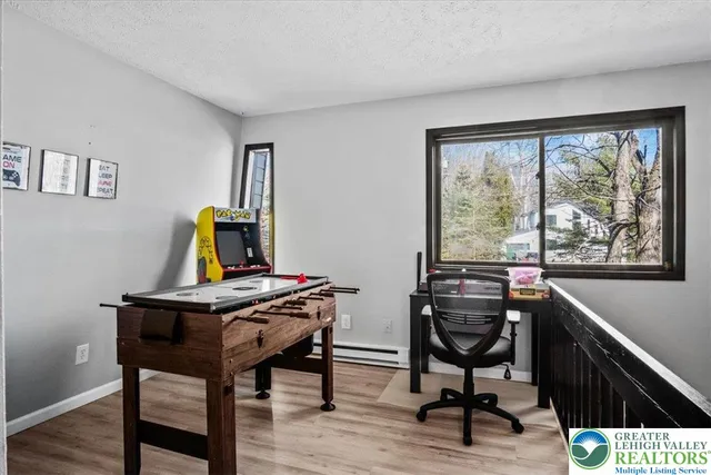 a view of a workspace with furniture