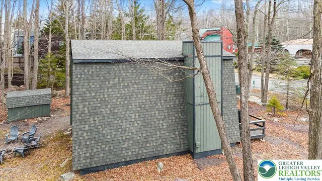 a bathroom with a shower and a sink