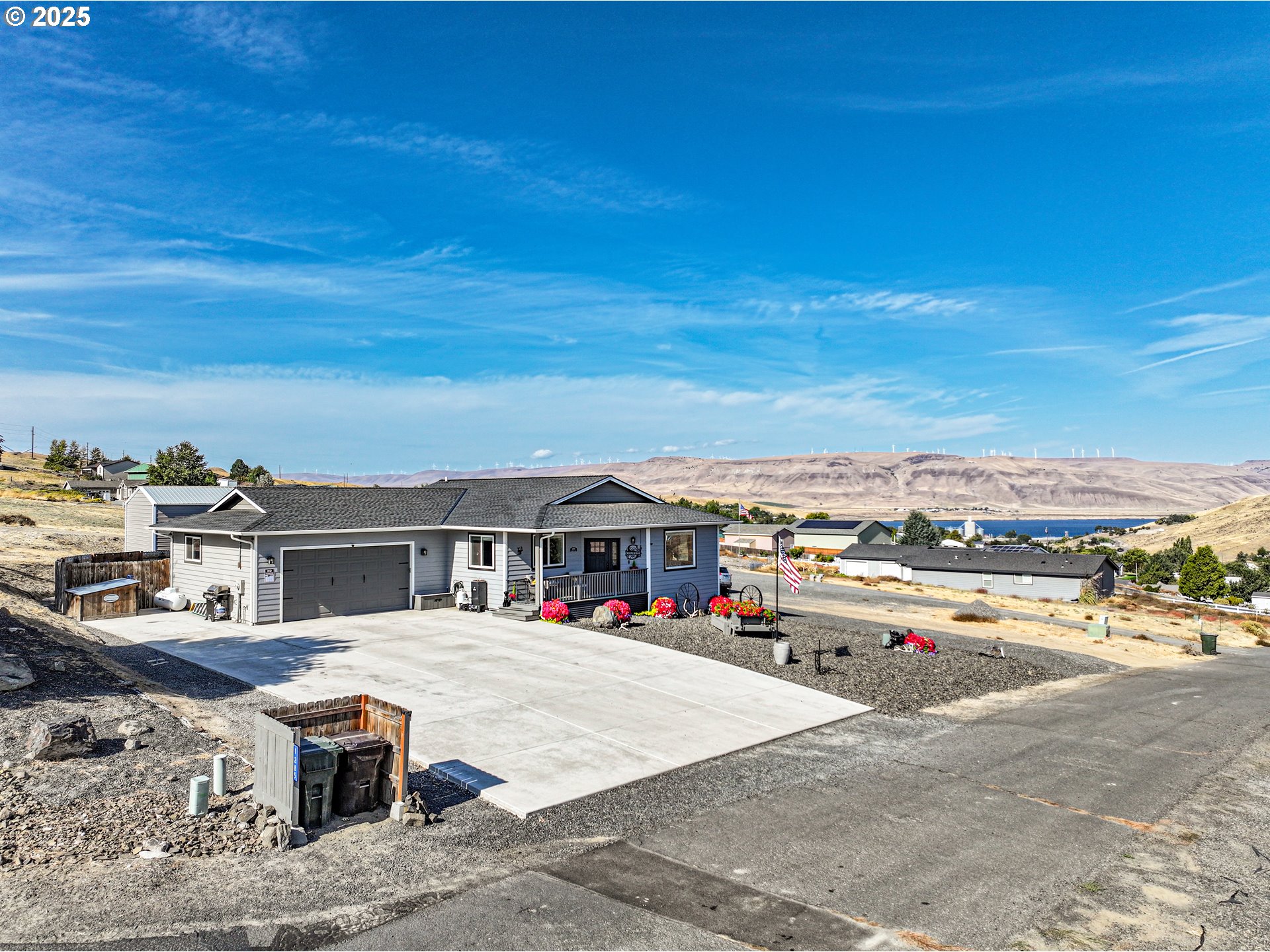 a view of houses with outdoor space and lakeside