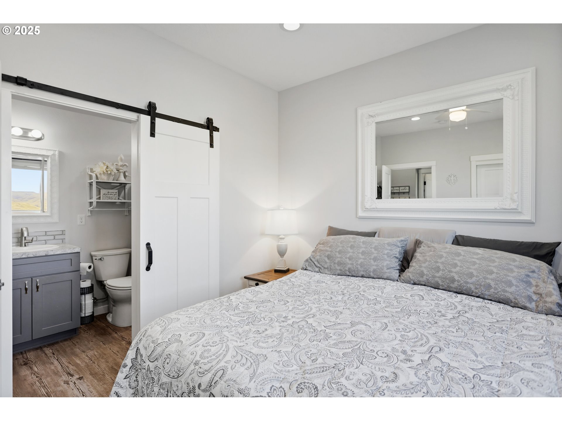 1275 Wright Road Arlington, OR 97812 - Photo 15 of 34 a bedroom with a bed and a window