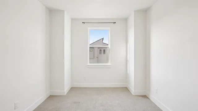 an empty room with window