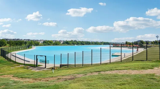 a view of a golf course with a lake