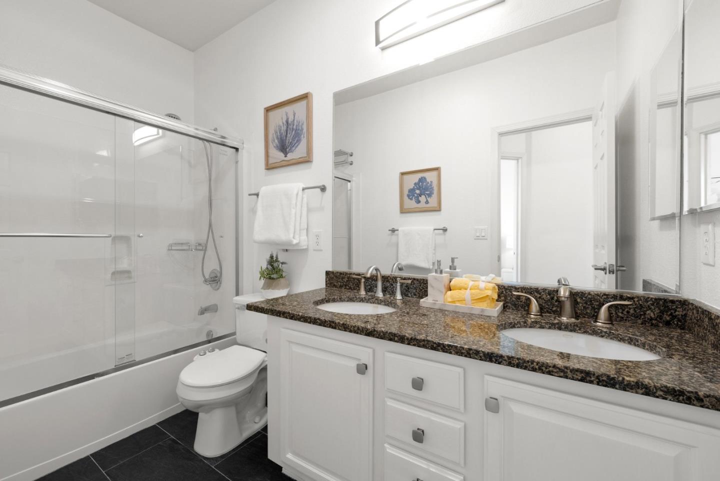 4675 La Crescent Loop San Jose, CA 95136 - Photo 15 of 22 a bathroom with a granite countertop sink mirror vanity and toilet