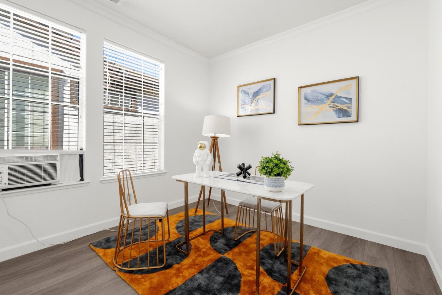 4675 La Crescent Loop San Jose, CA 95136 - Photo 16 of 22 a view of a dining room with furniture window and wooden floor