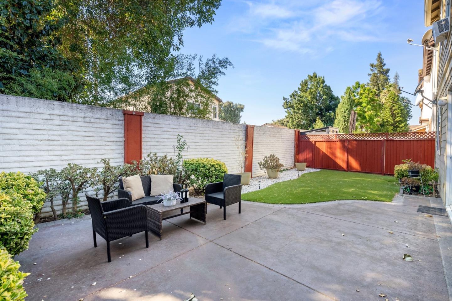 4675 La Crescent Loop San Jose, CA 95136 - Photo 19 of 22 a backyard of a house with outdoor seating and green space