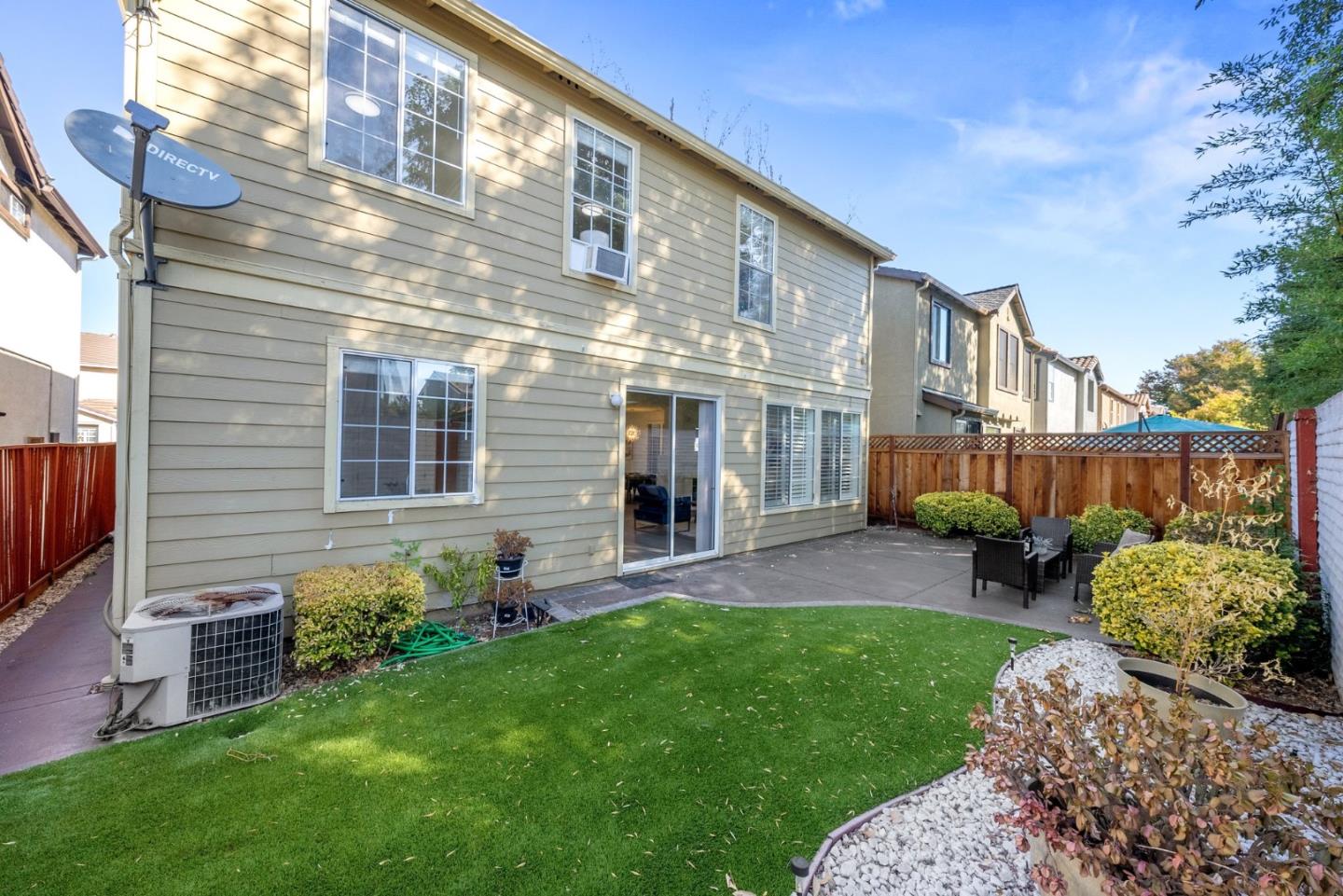 4675 La Crescent Loop San Jose, CA 95136 - Photo 20 of 22 a view of a building with a yard
