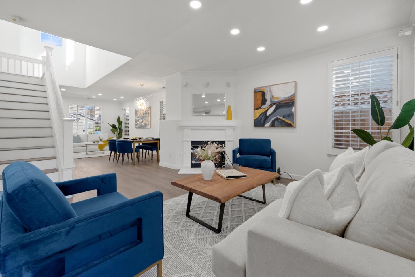 4675 La Crescent Loop San Jose, CA 95136 - Photo 5 of 22 a living room with furniture and a dining table with kitchen view